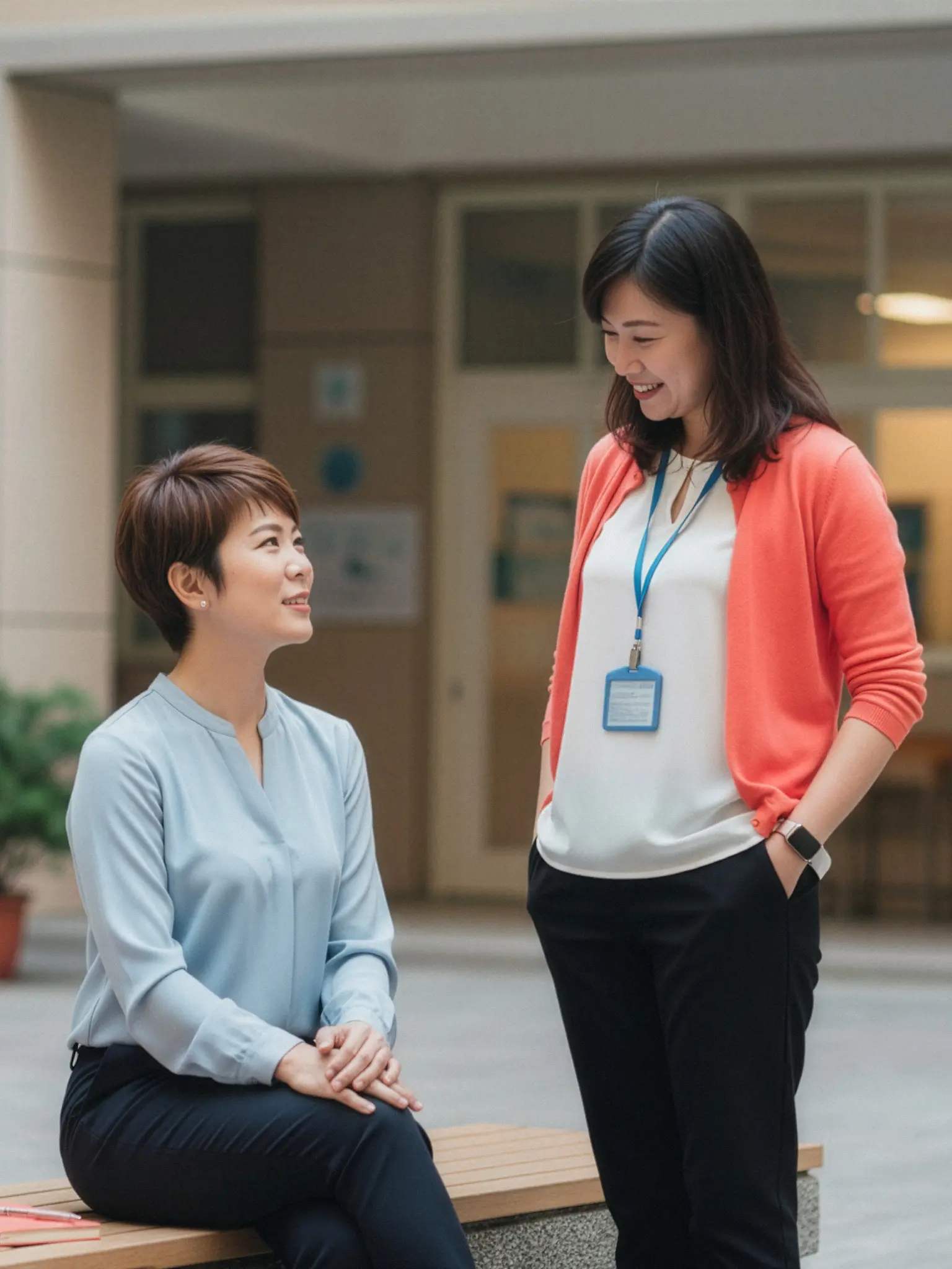 Two teachers discussing their work